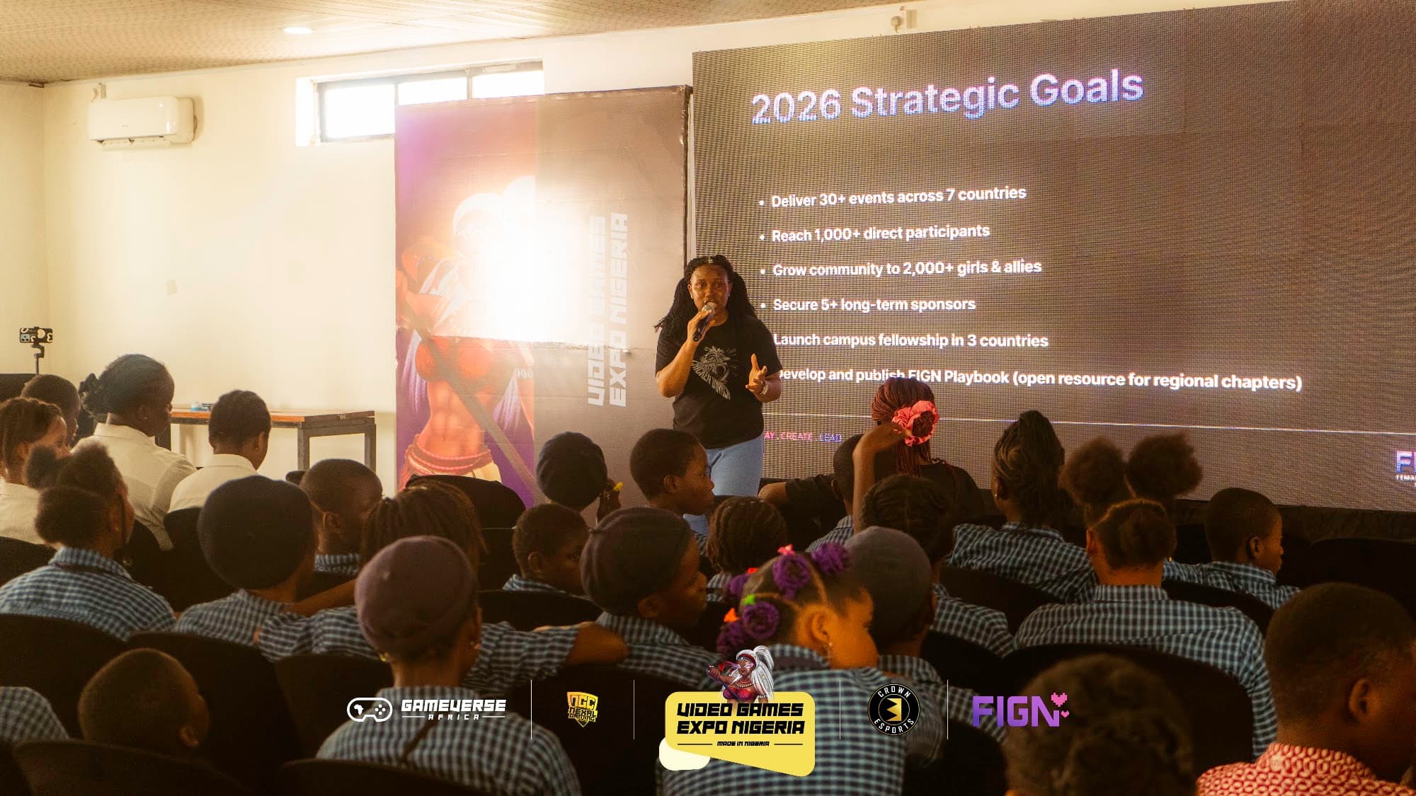 FIGN founder presenting to a full room at the launch