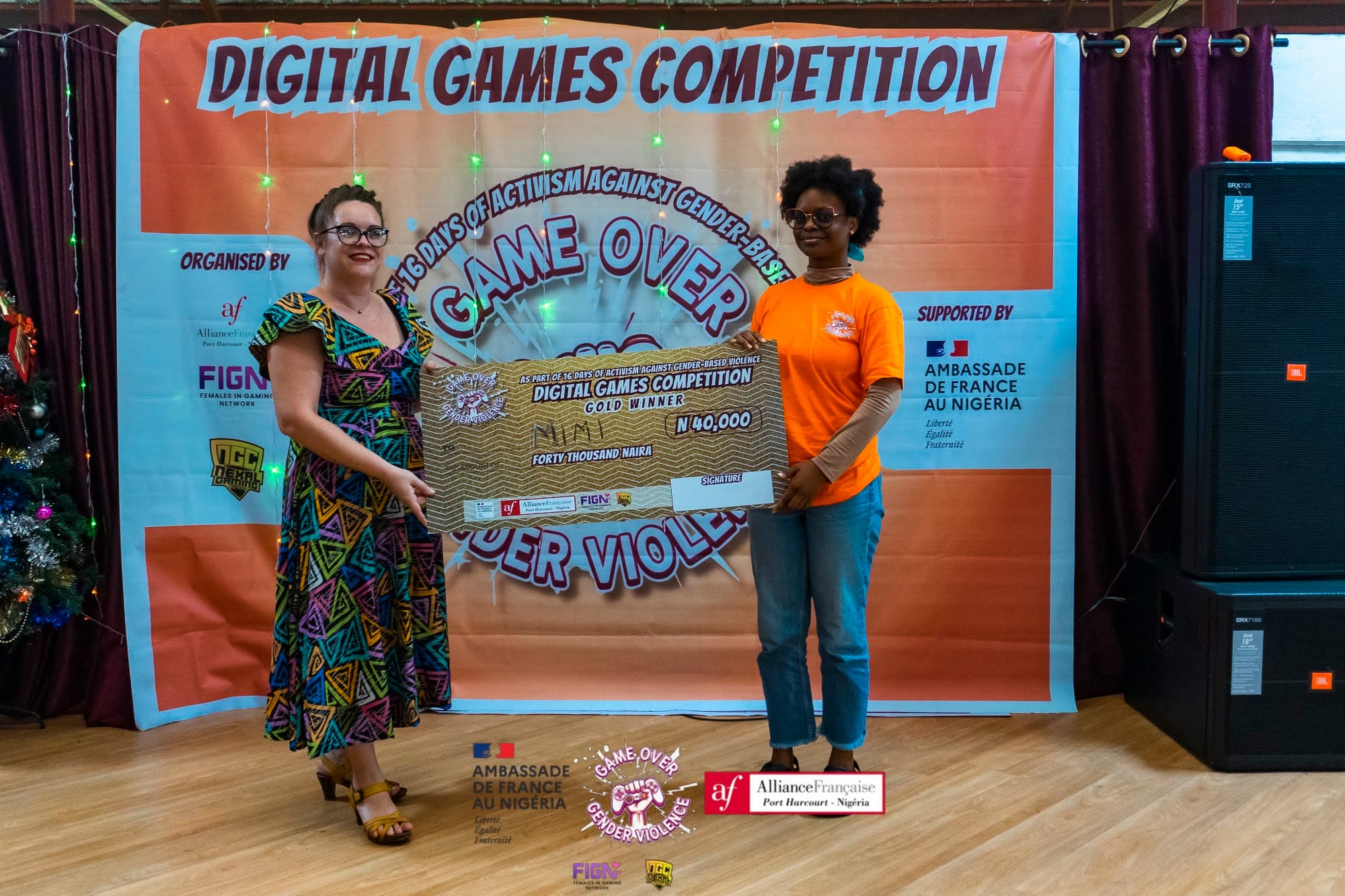 Game Over GBV gold winner receiving her prize